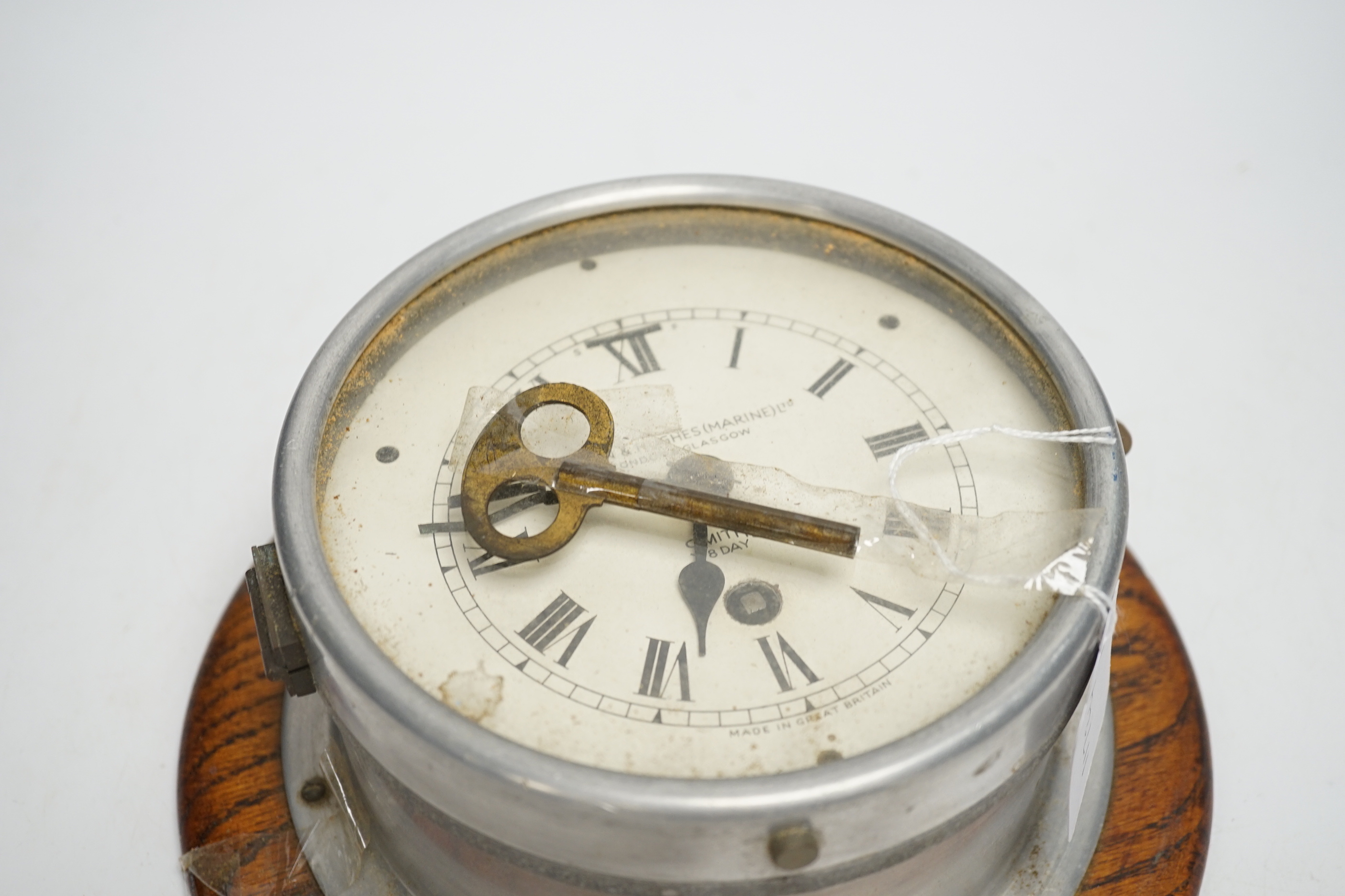 A Kevin & Hughes (Marine) Ltd ship's clock by Smiths